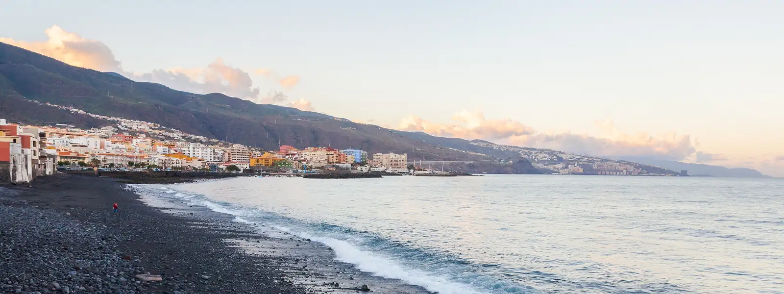 Candelaria beach and town at dawn